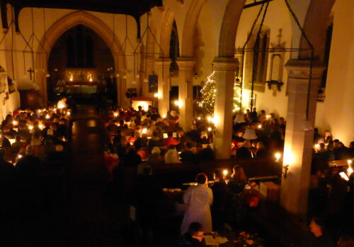 Candles fill the room at St Martins Christingle 2018
