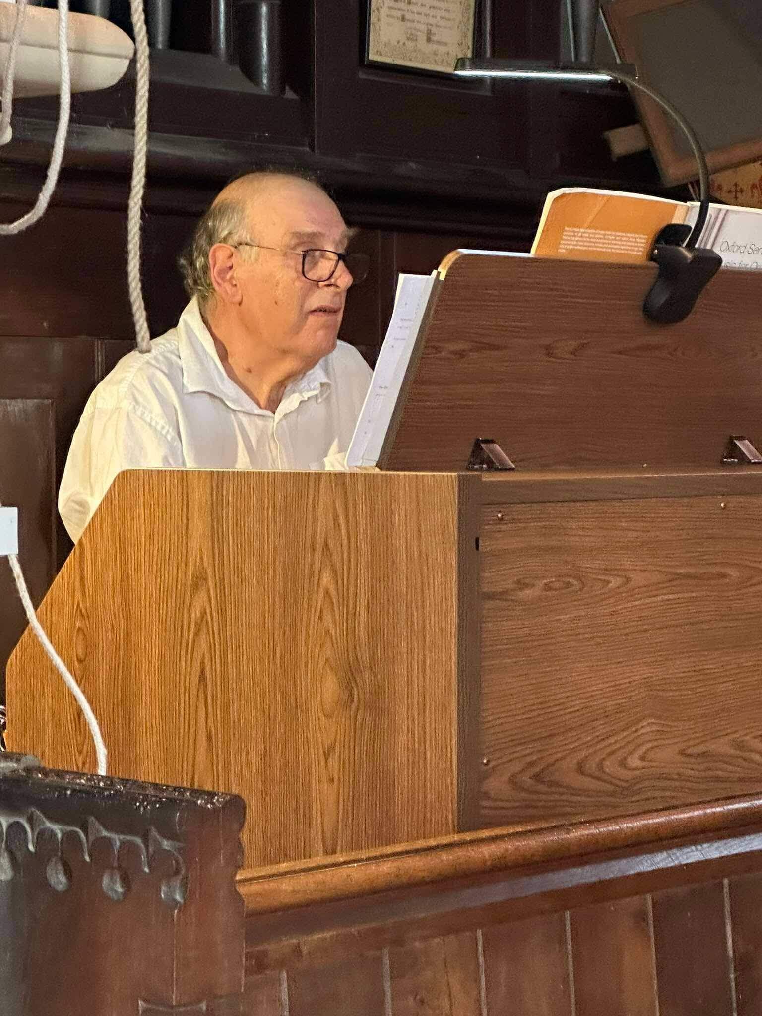 David Moss playing the new church organ.