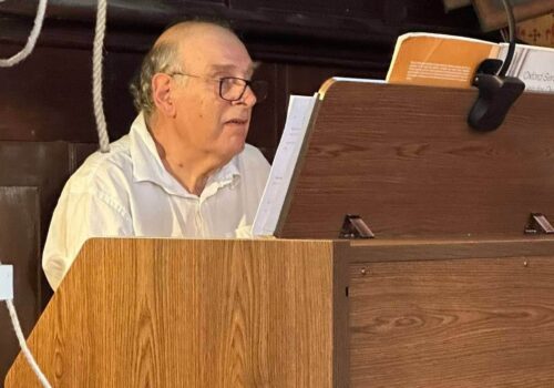 David Moss playing the new church organ.