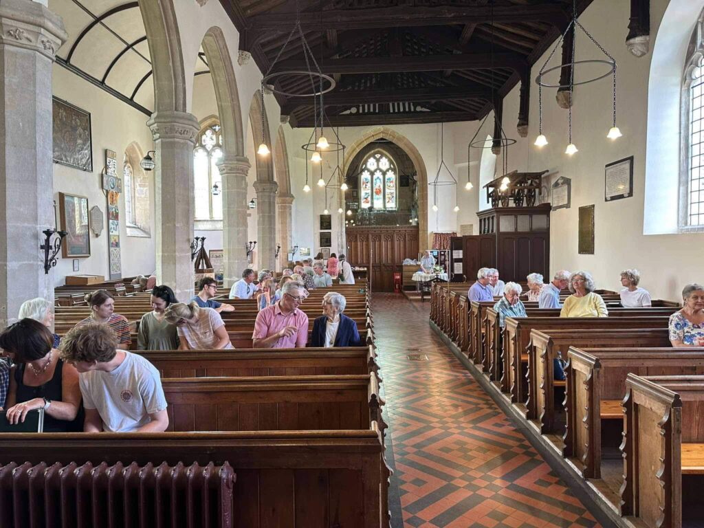 Picture taken inside the church looking at the congregation.